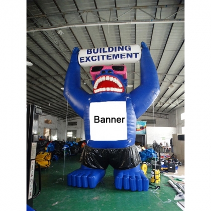 inflatable gorilla holding b...