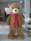 big plush brown bear adverti...