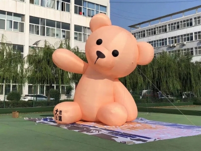 inflatable bear cartoon adve...