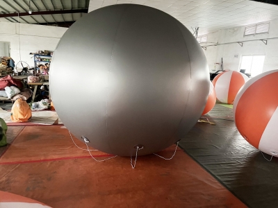 silver inflatable sphere bal...
