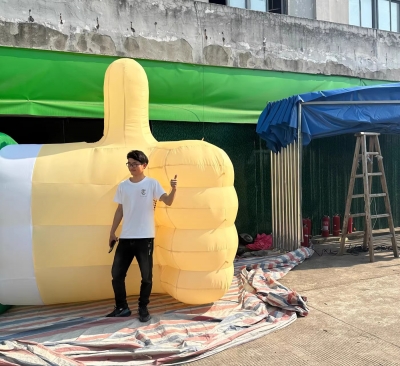 Inflatable thumbs up replica